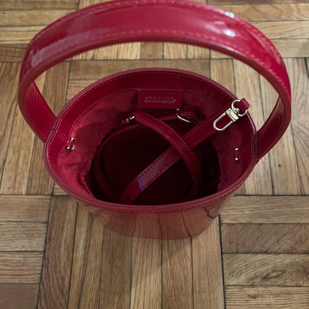 Staud red patent bucket bag